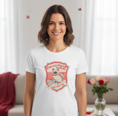 Smiling woman wearing white t-shirt with vintage Valentine cats design reading Purr-fectly Paw-some Valentine
