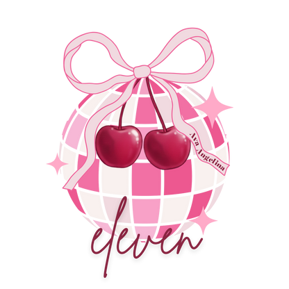 Pink checkered ball with cherries and a bow, featuring the brand 'eleven'.